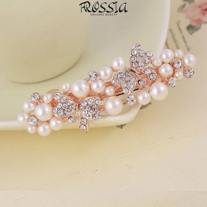 Barrette avec perle blanche