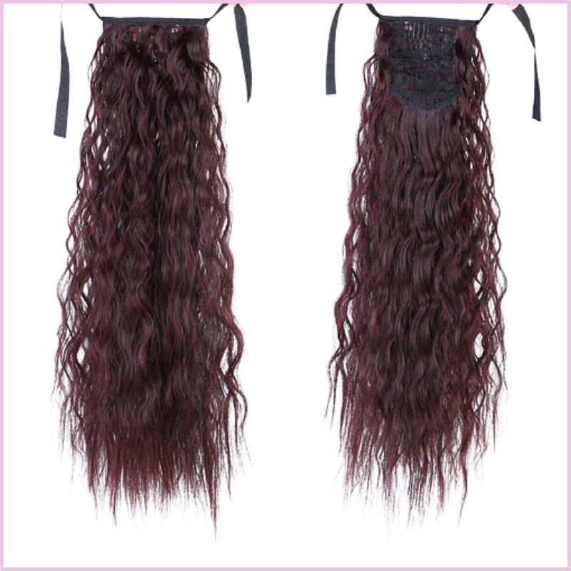 Postiche queue de cheval cheveux frisée auburn